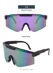 Close-up of black cycling sunglasses with red blue spots and purple gradient lens