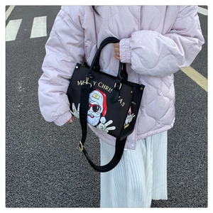 Fashionable black tote bag with cartoon Santa print and detachable shoulder strap