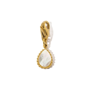 Macro detail of teardrop stainless steel pendant with mother of pearl and lobster clasp