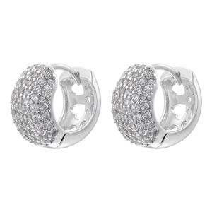 Detail showing heart-shaped cutouts and pave-set zircons on silver huggie earrings
