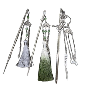 Elegant Chinese lotus sword hair pin set with silver finish and green silk tassels
