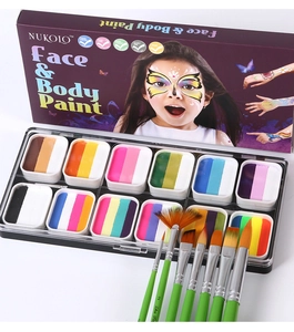 Detail of 12-color water-based body paint palette with professional brushes and gift box