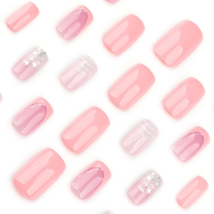 Pink French gradient press-on nails with star sequins and marble patterns