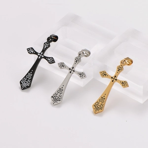Gothic cross pendants in black, silver, and gold steel shown from a 45-degree angle