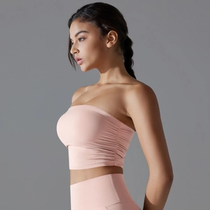 Pink minimalist seamless yoga sports bra and high-waisted leggings set for gym workout