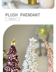 Close-up of sequin Christmas tree ornaments with gold stars in purple, silver, and gold