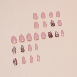 Short almond press-on nails set in soft pink solid color and marble pattern design