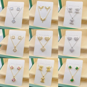 Elegant jewelry set with necklace and stud earrings in clover and heart shapes