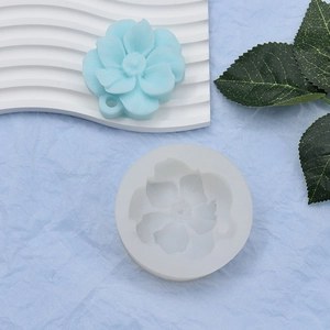Flower pendant silicone mold for DIY soap or cake decoration with light blue resin flower