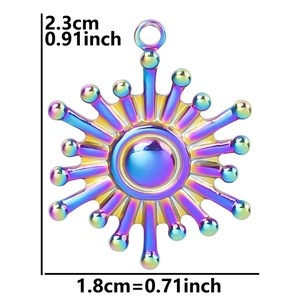 Macro shot of rainbow stainless steel sun pendant showing size 2.3cm by 1.8cm on white background