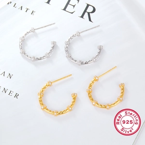 Elegant 925 sterling silver C-shaped twisted earrings with pavé zircon stones
