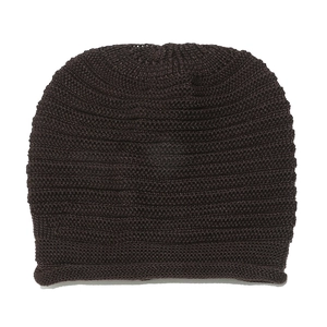 Close-up of dark brown knit beanie showing detailed horizontal stitch texture and rolled edge