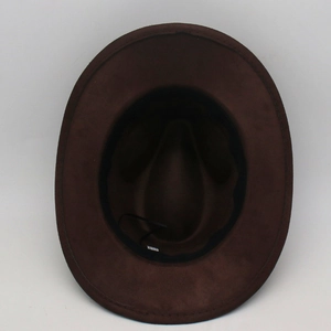Detail view of the brown cowboy hat interior with black sweatband and stitching