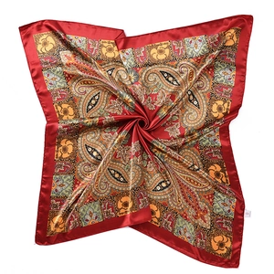 Deep red square silk scarf with vintage Paisley patterns and smooth glossy finish