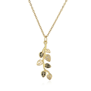 Detail of leaf pendant necklace with black enamel and zircon inlay on gold-plated chain