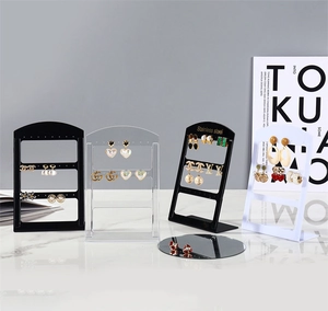 Three-tier jewelry display stand with 24 holes in black, white, and clear finishes