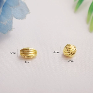 14K gold filled striped textured spacer beads in spindle and round shapes for DIY jewelry