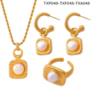 Polished hammered gold jewelry set featuring necklace earrings and pearl ring details