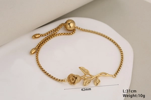 Detail view of gold rose flower bracelet with adjustable box chain and size parameters
