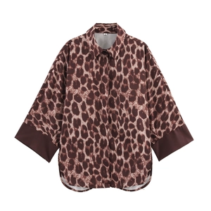 Women's classic leopard print button-down shirt with contrast cuffs and relaxed fit
