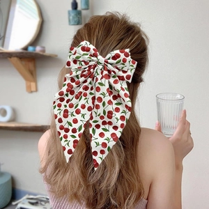 Chiffon hair clip with red cherry print and double-layered bow on long ribbon