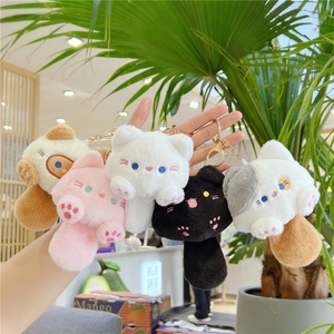 Set of five plush cat and dog keychain pendants with golden metal clips and soft texture