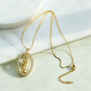 Gold plated oval reaper pendant necklace with sparkling zircons and box chain for women