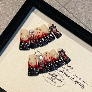 Handmade gothic duckbill press-on nails with 3D cat faces and metal skull accents