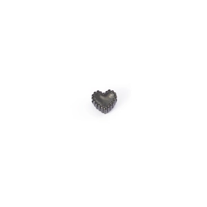 Detailed macro shot of a heart-shaped gunmetal bead with delicate beaded edge texture
