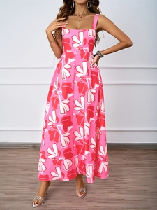 Close-up of pink floral maxi dress with square neck and large white flower pattern details