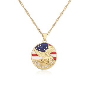 Detail of gold plated necklace with American flag eagle pendant and zircon crystals