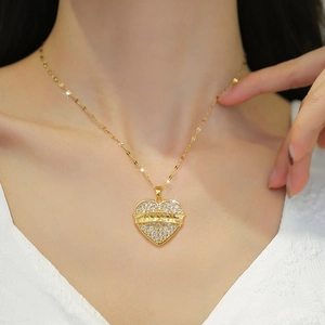 Elegant gold-plated heart necklace for women featuring sparkling stones and MAMA engraving