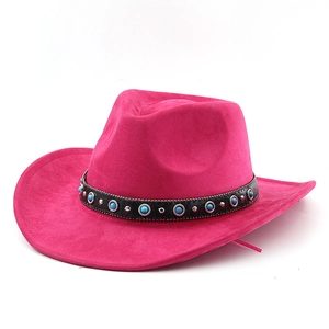 Detail of rose red felt cowboy hat with bohemian leather band and blue beads