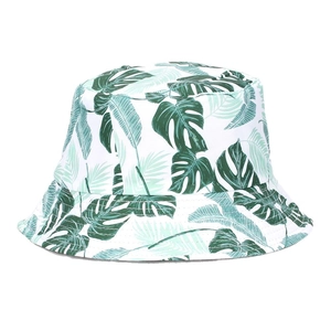 Bob blanc avec motifs de feuilles tropicales vertes pour protection solaire et mode casual