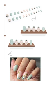 Salbeigrüne Aufklebe-Nägel mit Gänseblümchen-Muster inklusive Trageeffekt und Nagelset