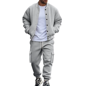 Detail of light gray baseball jacket with ribbed collar and matching cargo joggers