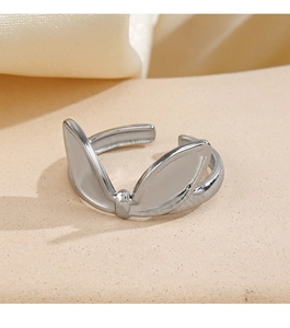 Close-up of a silver stainless steel bunny ear ring with an adjustable open design