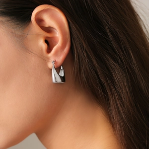 Polished silver geometric hoop earrings made of titanium steel with minimalist design