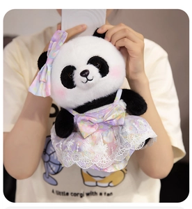 Close-up of plush panda doll wearing a purple floral dress with delicate lace details