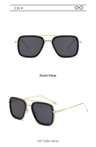 Close-up of black and gold square frame sunglasses with double bridge metal detailing