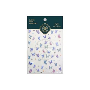 Holographic laser butterfly nail art stickers in blue and purple with M-870 packaging