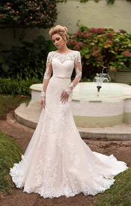 Robe de mariée sirène exquise avec manches longues en dentelle transparente et ceinture noeud
