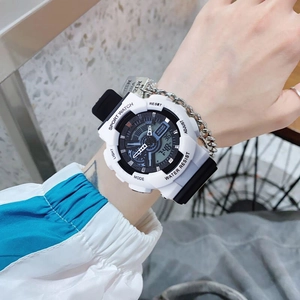 Dual-display sports watch in white and black with silver metal chain on model wrist
