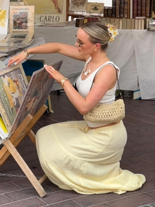 Chic yellow low-waist tiered maxi skirt with pleated detail for summer vacation style