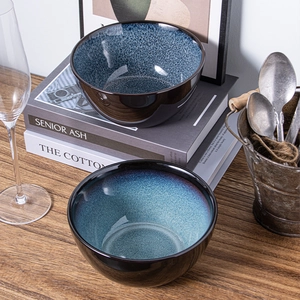 Japanese style kiln glazed ceramic bowls set with blue gradient interior and black exterior