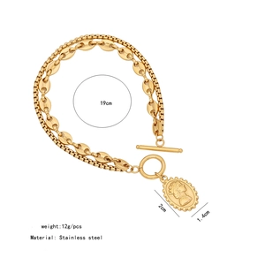 Double-layer stainless steel bracelet with oval portrait pendant and toggle clasp detail