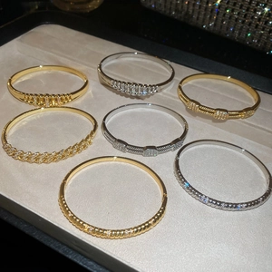 Variety of 18k gold plated hollow zircon bangles in elegant gold and silver finishes