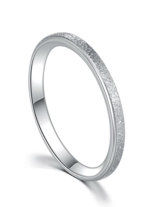 Detailed shot showing the contrast between frosted and polished silver stainless steel ring