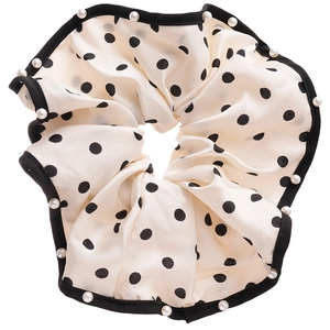Chic cream polka dot hair scrunchie with elegant pearl edge and soft satin texture