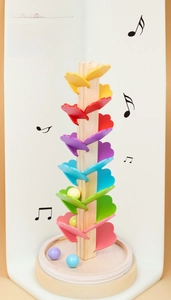 Detailed view of rainbow wooden music tree toy with colorful petal tracks and balls